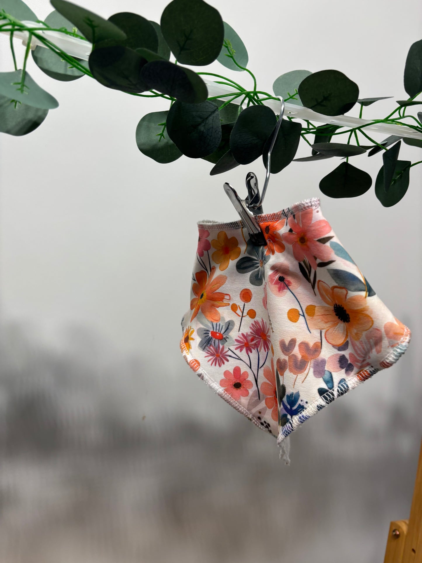 Floral towelling bib