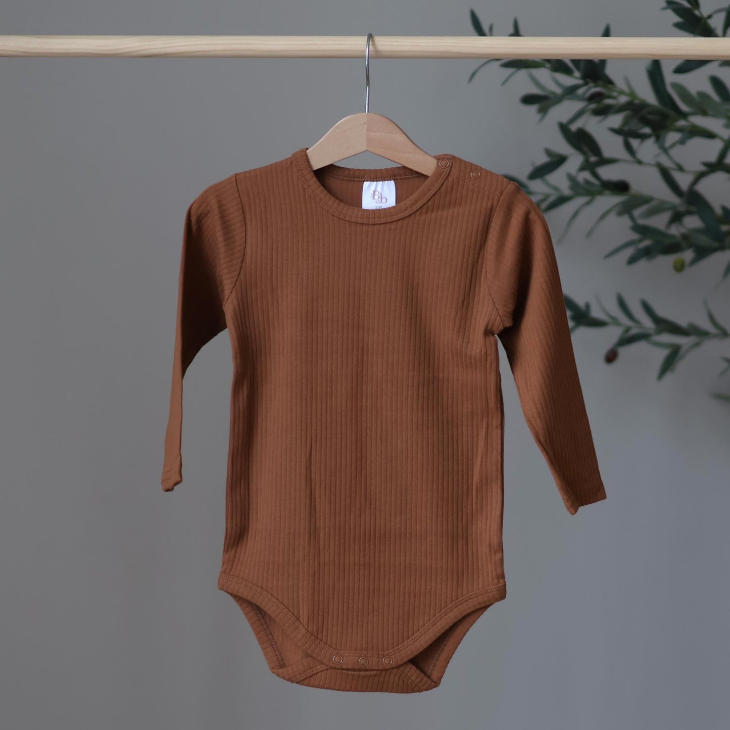 Rust ribbed bodysuit